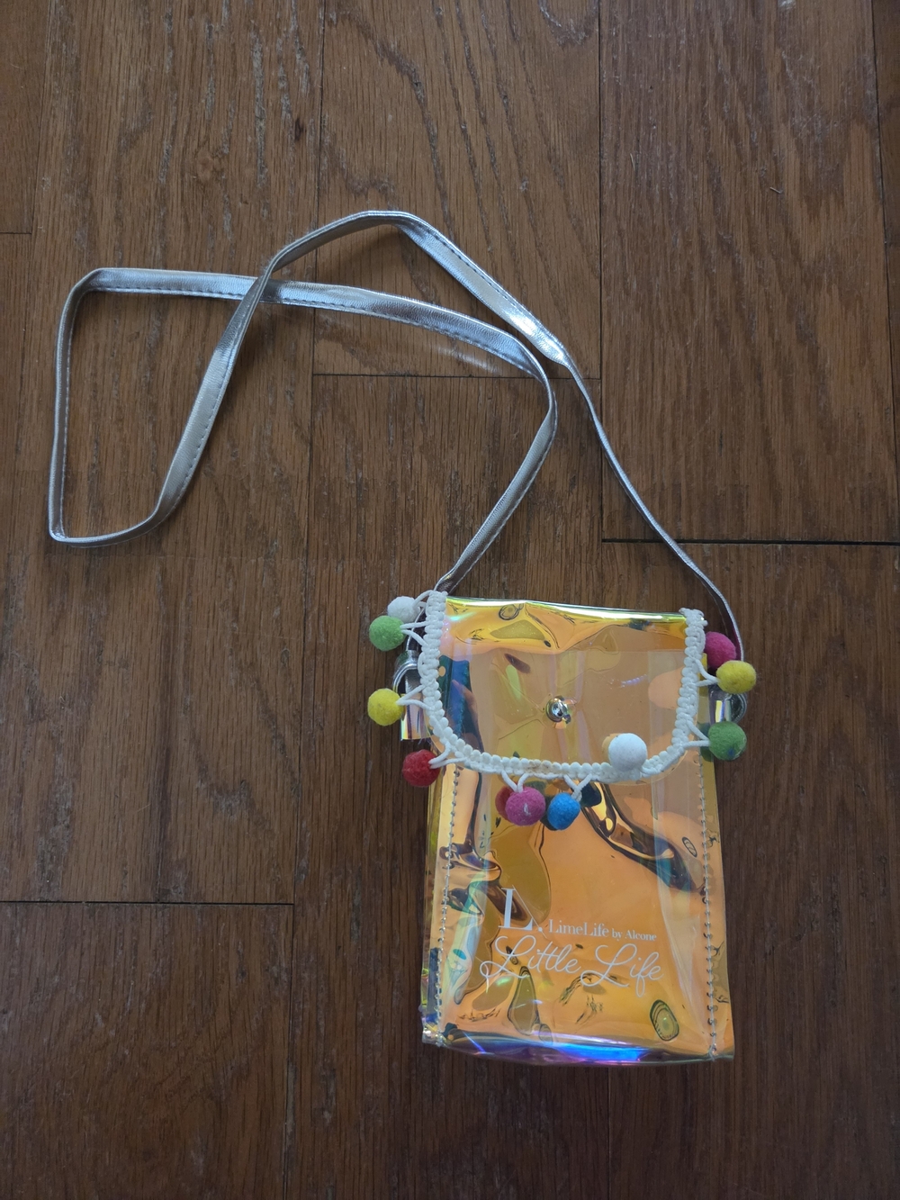 Iridescent Holographic Crossbody with Colorful Pom Pom Trim. Limelife